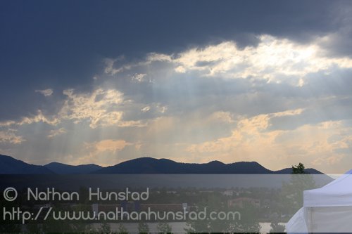 Sunlight streams through the clouds at the Colorado Irish Festival